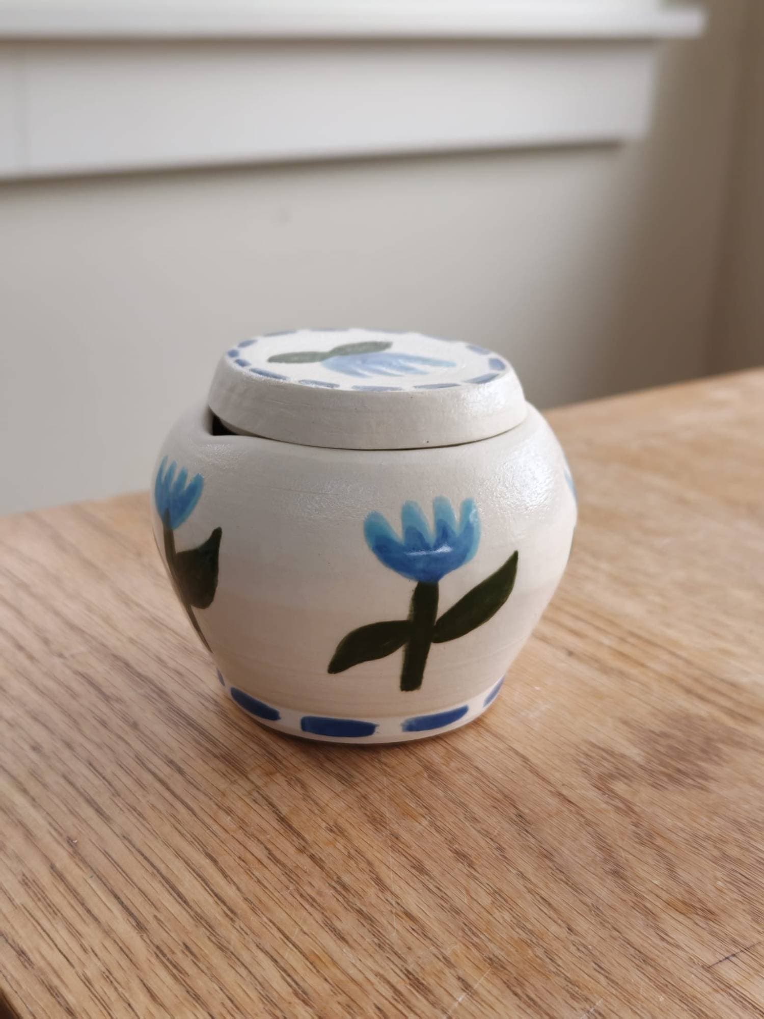 Lidded pot, blue tulips
