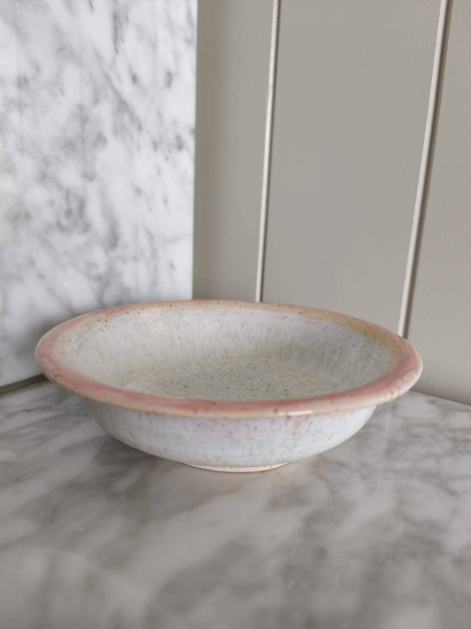 Shallow bowl, pink rim