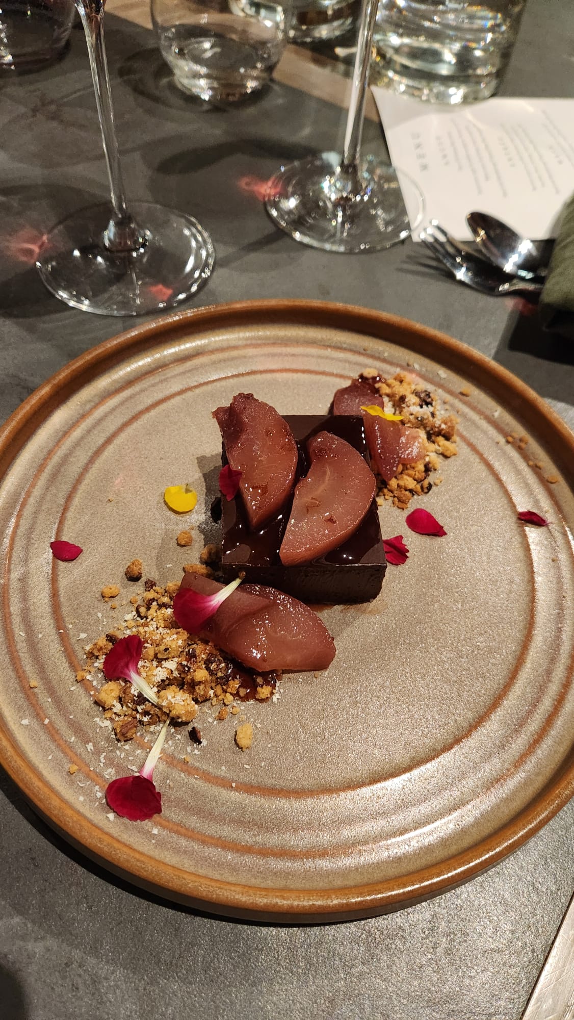 Chocolate delice, poached fruit, rose